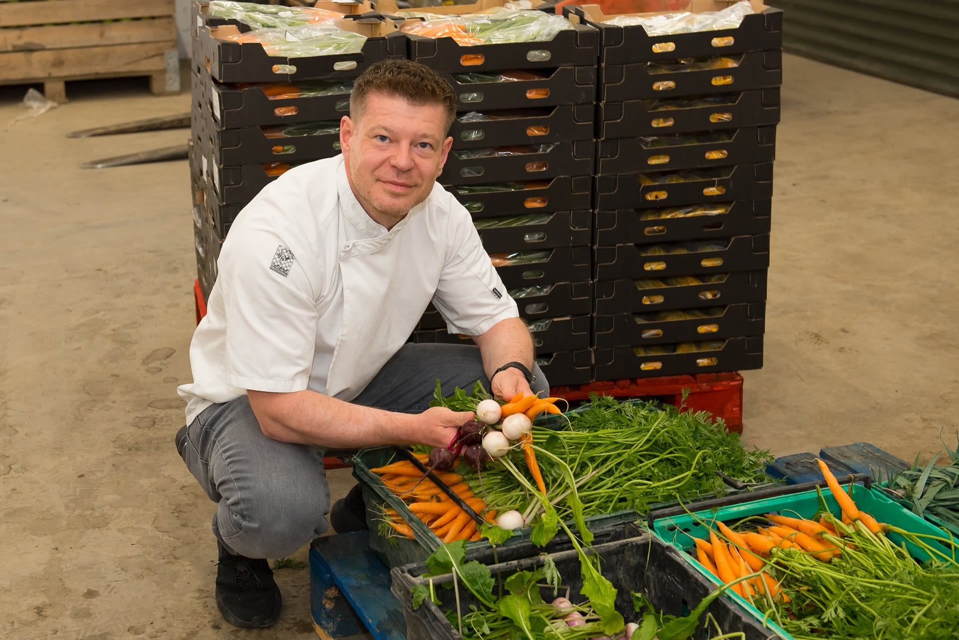 chef with fresh ingredients